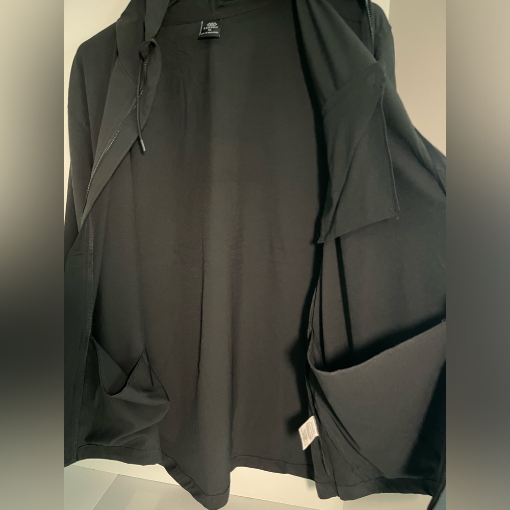 LEG3ND STRETCH FULL ZIP LONG SLEEVE WATER-RESISTANT UNLINED HOODED JACKET - Picture 9 of 16